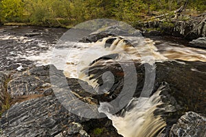 Eau Claire River Waterfall In Autumn