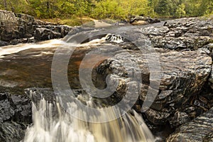 Eau Claire River Waterfall In Autumn