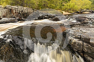 Eau Claire River Waterfall In Autumn