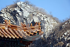 The eaves of an ancient Chinese building in the mountains.