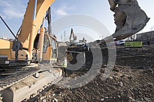 eavy machinery for earthworks and building project
