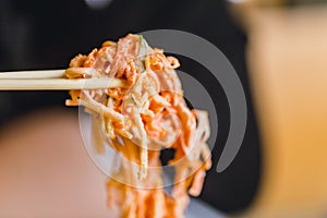 Ebiko or Tobiko fish egg salad closeup at tip