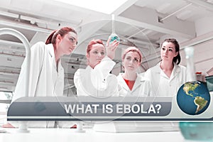 Ebola news flash with medical imagery photo