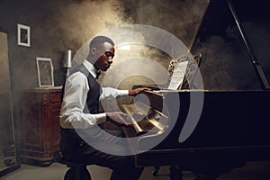 Ebony pianist, jazz performer on the stage