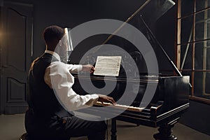Ebony pianist, jazz performer on the stage