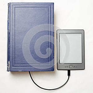 EBook connected to the old thick blue book with a cable