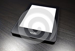 EBook reader Kindle 4 on black background