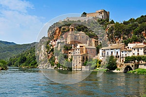 The Ebro River and the old town of Miravet, Spain photo