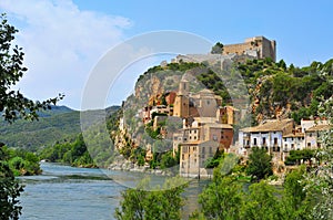 The Ebro River and the old town of Miravet, Spain photo