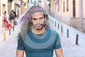 Eccentric man with long haired dyed hair