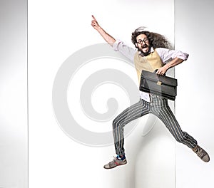 Eccentric man pointng on the empty board