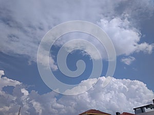 An eccentric snapshot of a pretty view of a new pattern of white clouds in sunny blue sky