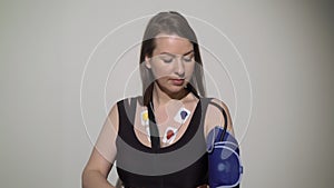 ECG sensors, electrocardiogram and blood pressure measurement. Woman with Holter