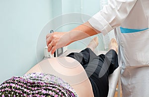 Echography of pregnant woman photo