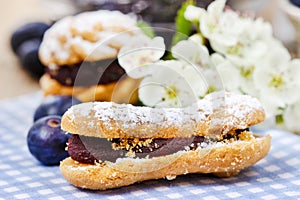 Eclairs with blueberry marmalade