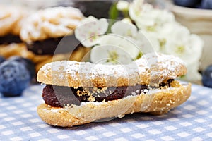 Eclairs with blueberry marmalade