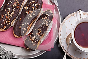 Eclairs cakes with chocolate glaze