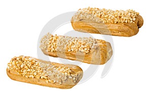 Eclairs with pieces of peanut isolated on white background