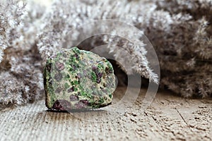 Eclogite rock with green pyroxene and red garnet photo