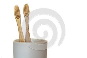Eco Bamboo toothbrush on white background with copy space