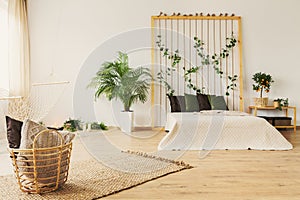 Eco bedroom with rope wall