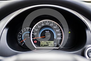 Eco car instrument cluster show kilometers per liter