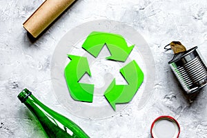 Eco concept with recycling symbol on table background top view m