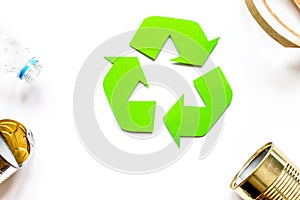 Eco concept with recycling symbol on table background top view m