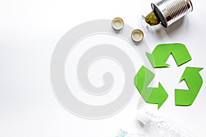 Eco concept with recycling symbol on table background top view mock up