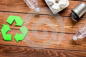 Eco concept with recycling symbol on table background top view mock-up