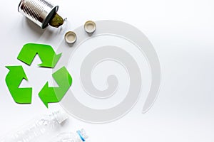 Eco concept with recycling symbol on table background top view mock up