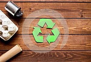 Eco concept with recycling symbol on table background top view mock-up