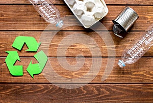 Eco concept with recycling symbol on table background top view mock-up