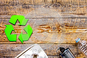 Eco concept with recycling symbol on table background top view mockup