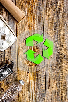 Eco concept with recycling symbol on table background top view mockup