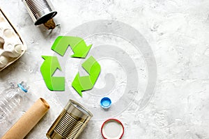 Eco concept with recycling symbol on table background top view mockup