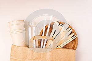 Eco craft paper tableware,cups,fast food containers.Recycling,eco-friendly concept.Disposable eco cutlery,plates,spoons