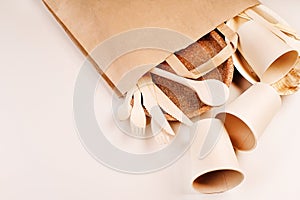 Eco craft paper tableware,cups,fast food containers.Recycling,eco-friendly concept.Disposable eco cutlery,plates,spoons