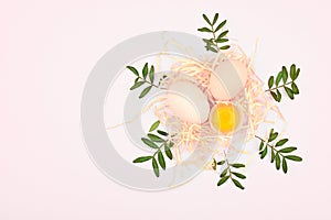 Eco eggs on a white background. A tray of eggs on a white and pink background. eco tray with testicles. minimalistic trend, top