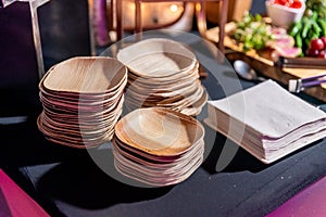 Eco environmentally friendly palm leaf plates from natural sustainable leaves photo