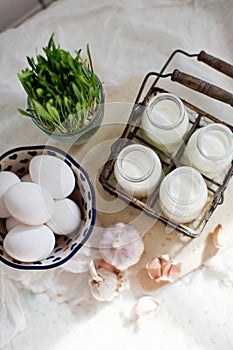 Eco farm products. Fresh eggs, milk and garlic