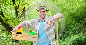 Eco farm worker. Harvest. sexy farmer hold shovel and box with pot. farming and agriculture. I love to work with plant