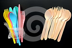 Plastic cutlery versus wooden, environmetally friendly cutlery photo