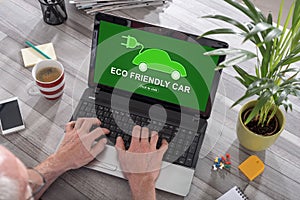 Eco friendly car concept on a laptop