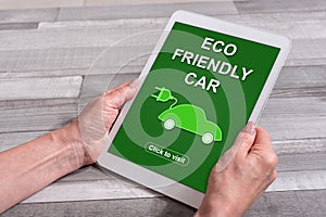 Eco friendly car concept on a tablet