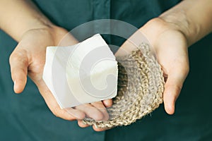 Eco-friendly cleaning kit in the woman`s hand