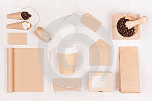 Eco friendly coffee template for design, advertising and branding - brown paper cup, blank notebook, box, sugar, card, beans.