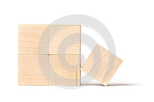 Eco-friendly constructor made of natural wooden blocks of cubic shape. Isolate on a white background