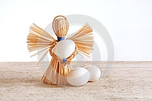 Eco-friendly doll toy and 3 eggs, family concept, Easter