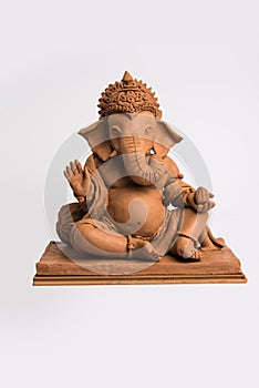 Eco friendly Ganesh/Ganpati idol or murti, home made. selective focus photo